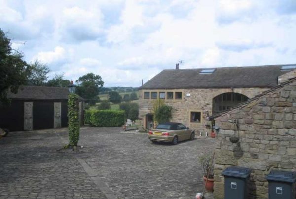 Conversion of detached garage to create two holiday cottages