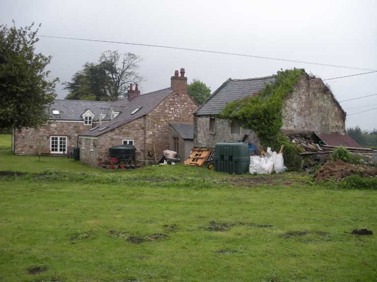 Erection of detached outbuilding in open countryside