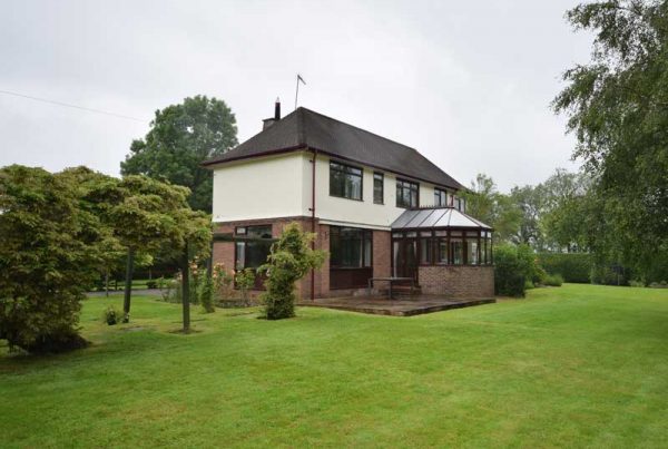 Permitted Development extensions to detached house in Green Belt (73%)